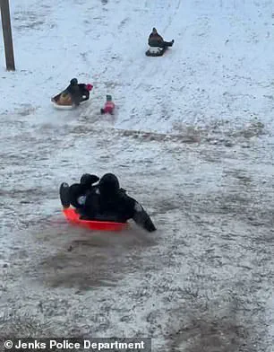 Oklahoma Police Officer Accidentally Collides with Child During Snow Day, Video Goes Viral