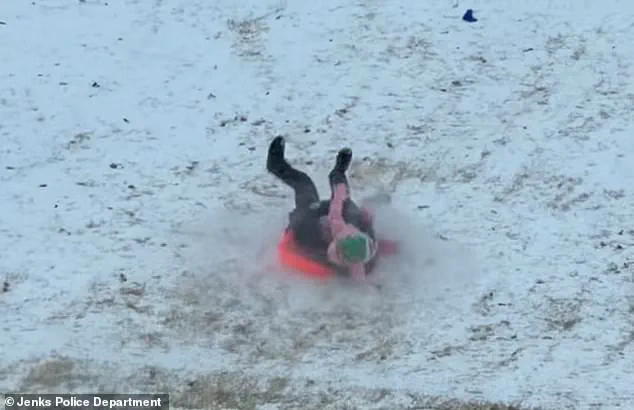 Oklahoma Police Officer Accidentally Collides with Child During Snow Day, Video Goes Viral