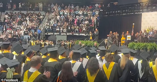 Hunter Metcalf receives diploma alongside posthumous award for brother Austin.