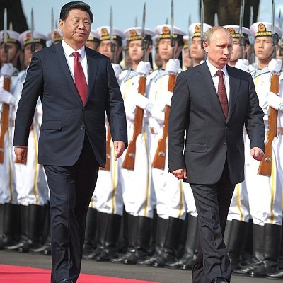 Russia intercepts 33 drones while Ukraine strike kills 21 students.