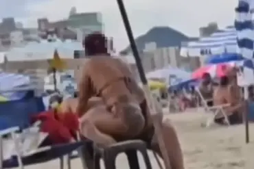 Brazilian beach kiss goes viral after police interruption