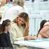 First Lady Melania Trump Dazzles in Cream Trench Coat at Easter Egg Roll