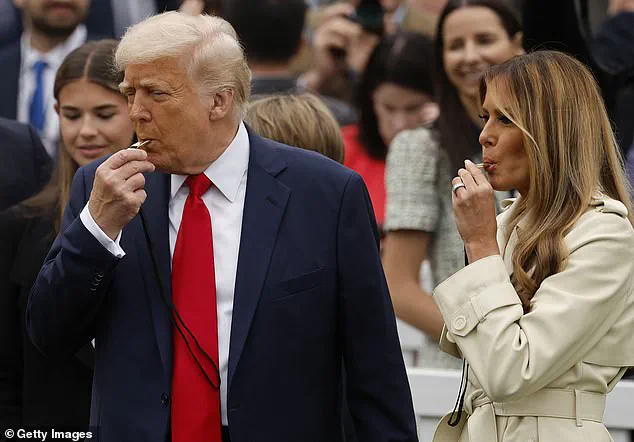 First Lady Melania Trump Dazzles in Cream Trench Coat at Easter Egg Roll