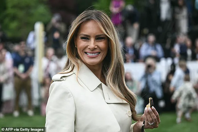 First Lady Melania Trump Dazzles in Cream Trench Coat at Easter Egg Roll