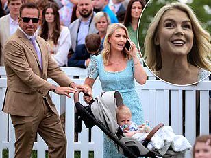 First Lady Melania Trump Dazzles in Cream Trench Coat at Easter Egg Roll